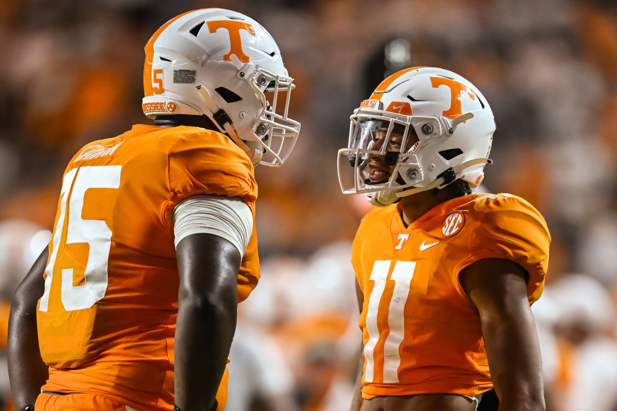 Sep 17, 2022; Knoxville, Tennessee, USA; Tennessee Volunteers wide receiver Jalin Hyatt (11) and offensive lineman Jerome Carvin (75) celebrate a touchdown during the first half against the Akron Zips at Neyland Stadium. Mandatory Credit: Bryan Lynn-USA TODAY Sports