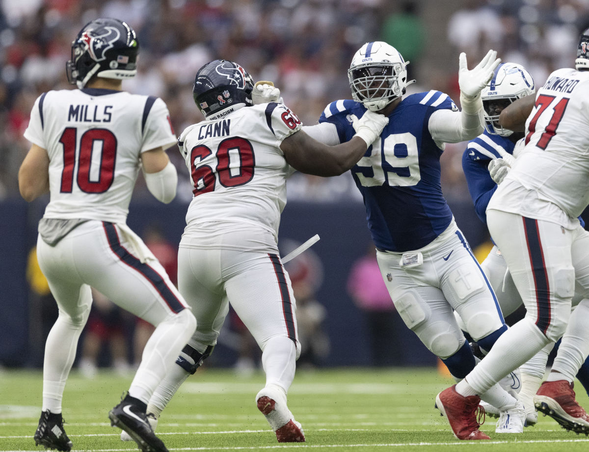 Sep 11, 2022; Houston, Texas, USA; Indianapolis Colts defensive tackle DeForest Buckner (99) rushes against Houston Texans guard A.J. Cann (60) in the fourth quarter at NRG Stadium. Mandatory Credit: Thomas Shea-USA TODAY Sports