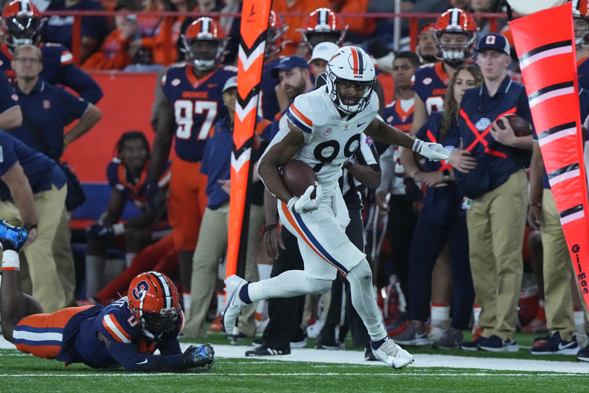 Virginia Cavaliers wide receiver Keytaon Thompson (99) runs with the ball after making a catch against the Syracuse Orange during the second half at JMA Wireless Dome.