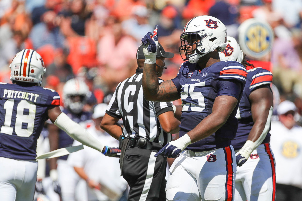 Auburn Tigers defensive end Colby Wooden (25) celebrates his tackle for loss during the game between the Missouri Tigers and the Auburn Tigers at Jordan-Hare Stadium on Sept. 24, 2022.