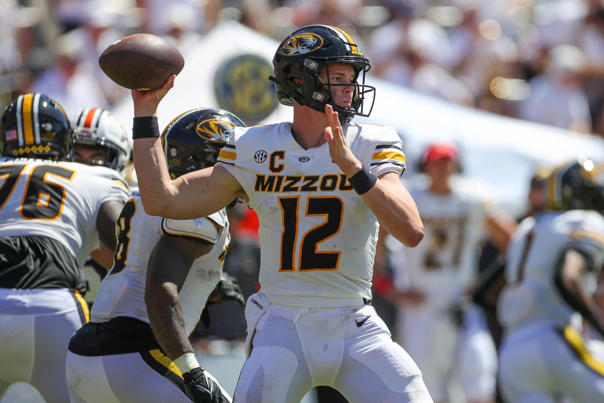 Missouri Tigers quarterback Brady Cook (12) looks to make the pass during the game between the Missouri Tigers and the Auburn Tigers at Jordan-Hare Stadium on Sept. 24, 2022.