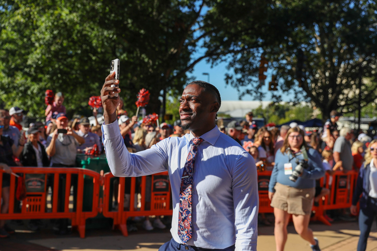 RGIII live streams his Tiger Walk experience prior to the game between the Missouri Tigers and the Auburn Tigers at Jordan-Hare Stadium on Sept. 24, 2022.