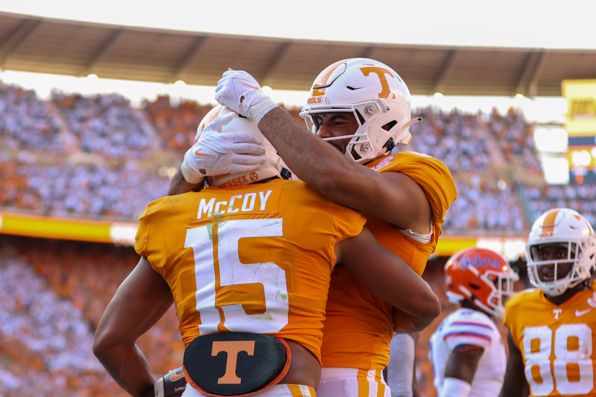 Tennessee Volunteers wide receiver Bru McCoy (15) celebrates with tight end Jacob Warren (87) after scoring a touchdown against the Florida Gators during the first half at Neyland Stadium.
