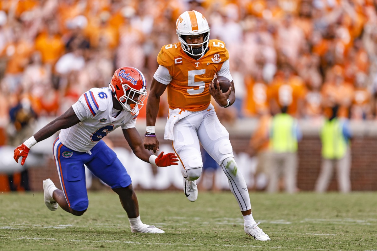 Hendon Hooker runs upfield for Tennessee.