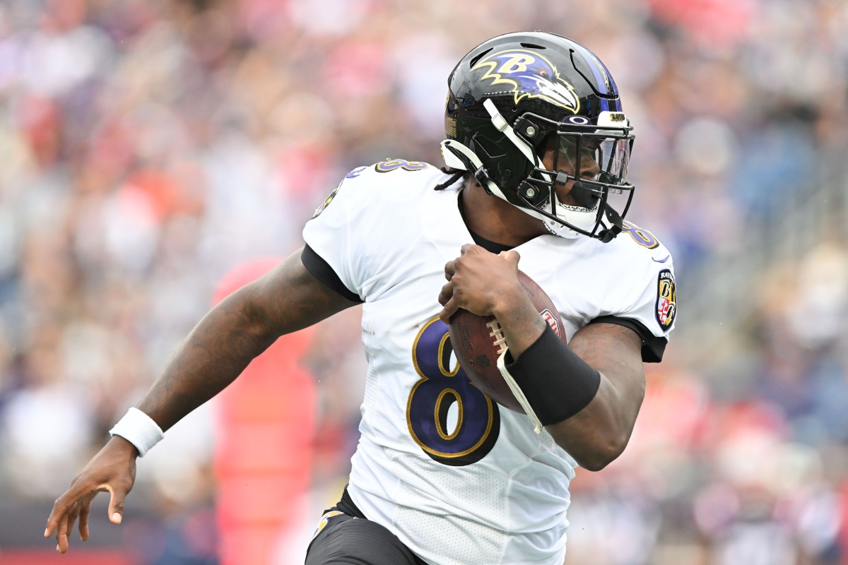 Ravens quarterback Lamar Jackson passed for four touchdowns and ran for another in Baltimore's win over the Patriots.