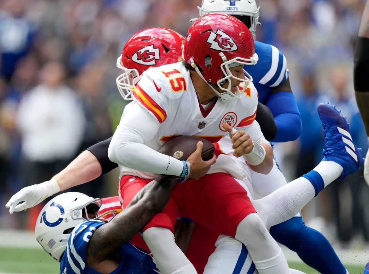 Indianapolis Colts defensive end Yannick Ngakoue (91) sacks Kansas City Chiefs quarterback Patrick Mahomes (15) on Sunday, Sept. 25, 2022, during a game against the Kansas City Chiefs at Lucas Oil Stadium in Indianapolis.