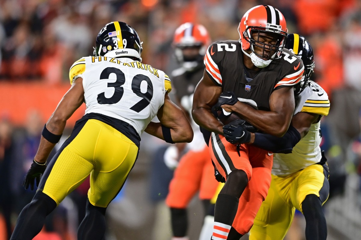 Sep 22, 2022; Cleveland, Ohio, USA; Cleveland Browns wide receiver Amari Cooper (2) catches a touchdown pass between Pittsburgh Steelers safety Terrell Edmunds (34) and safety Minkah Fitzpatrick (39) during the first quarter at FirstEnergy Stadium. Mandatory Credit: David Dermer-USA TODAY Sports