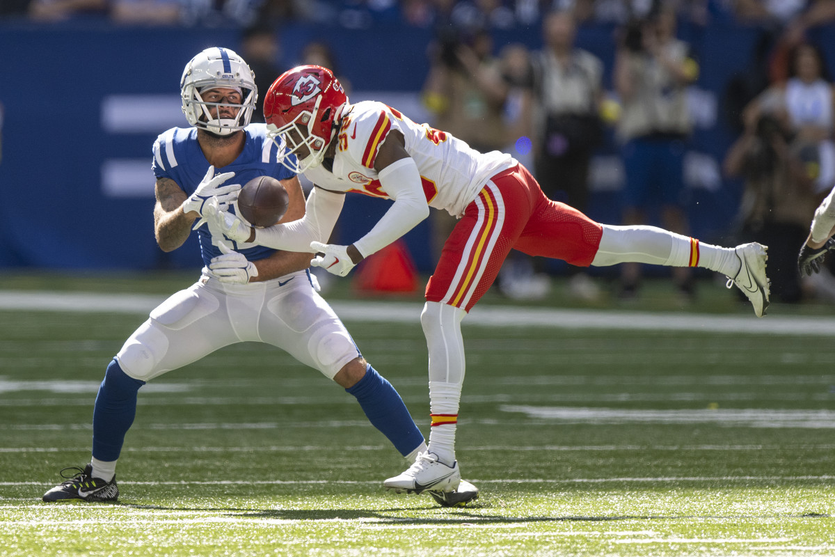 Sep 25, 2022; Indianapolis, Indiana, USA; Indianapolis Colts wide receiver Michael Pittman Jr. (11) catches a pass while being covered by Kansas City Chiefs cornerback L'Jarius Sneed (38) during the second half at Lucas Oil Stadium.