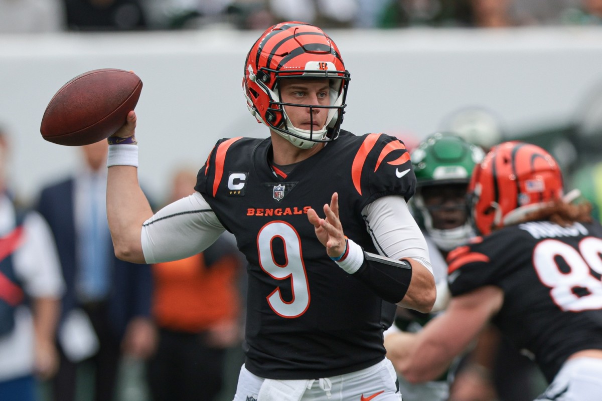 Sep 25, 2022; East Rutherford, New Jersey, USA; Cincinnati Bengals quarterback Joe Burrow (9) throws the ball against the New York Jets during the first half at MetLife Stadium. Mandatory Credit: Vincent Carchietta-USA TODAY Sports