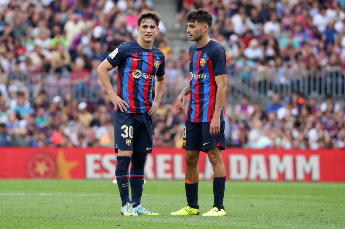 Barcelona midfielders Gavi (left) and Pedri (right) pictured during a game against Elche in September 2022