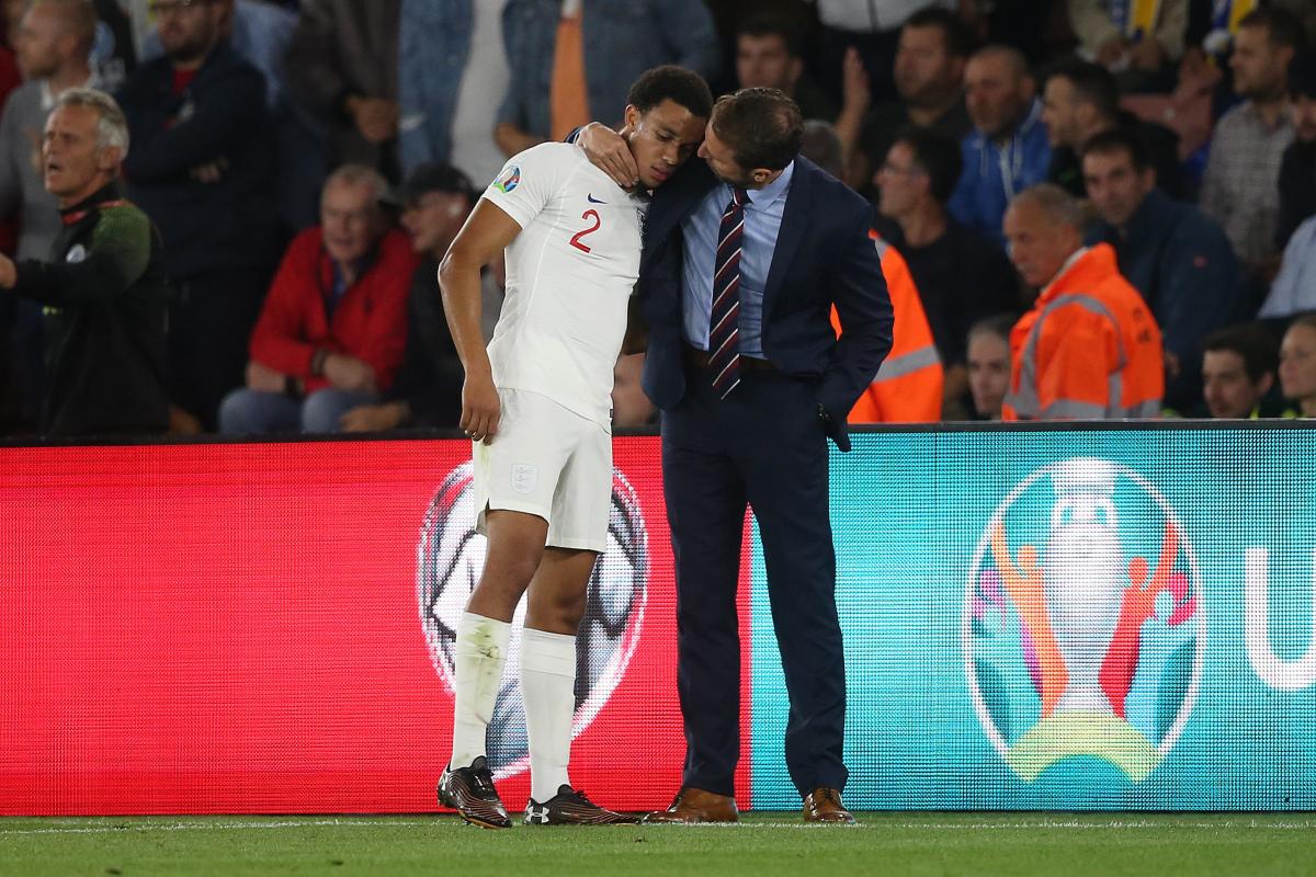 England manager Gareth Southgate pictured with his arm around Trent Alexander-Arnold in 2019
