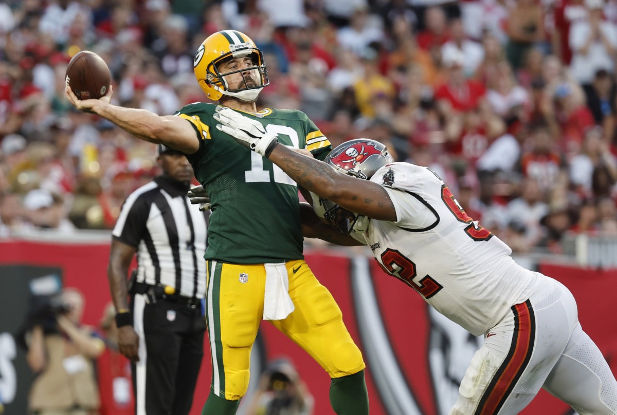 Packers quarterback Aaron Rodgers faces pressure during his team's 14-12 win over the Buccaneers.