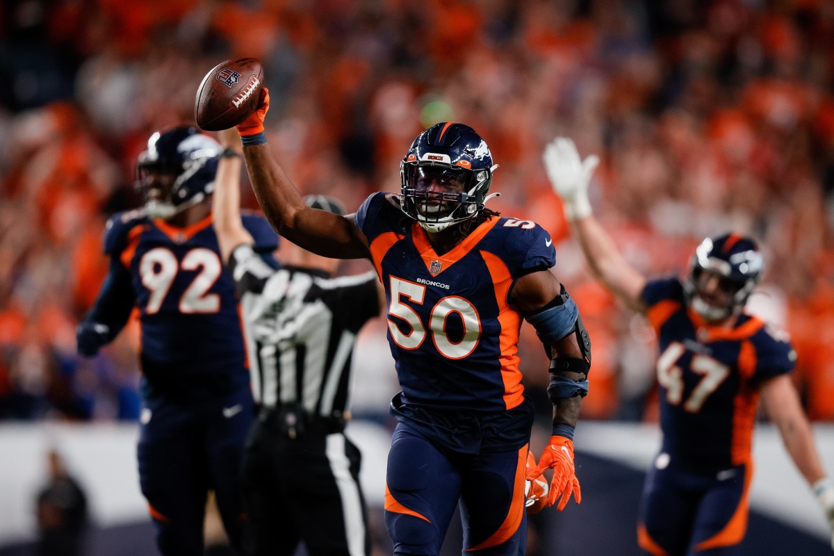 Denver Broncos linebacker Jonas Griffith (50) celebrates after an interception in the fourth quarter against the San Francisco 49ers at Empower Field at Mile High.