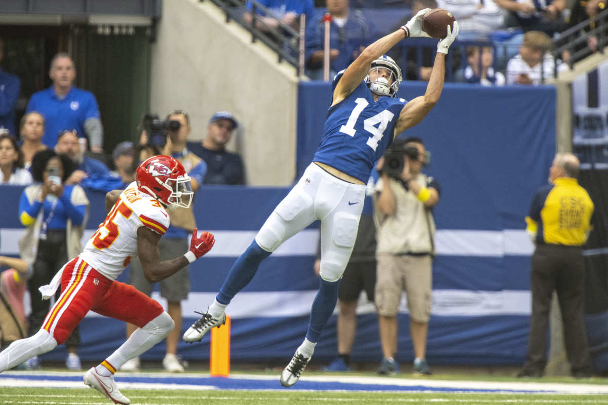 Sep 25, 2022; Indianapolis, Indiana, USA; Indianapolis Colts wide receiver Alec Pierce (14) catches a pass in front of Kansas City Chiefs cornerback Jaylen Watson (35) during the second half at Lucas Oil Stadium.