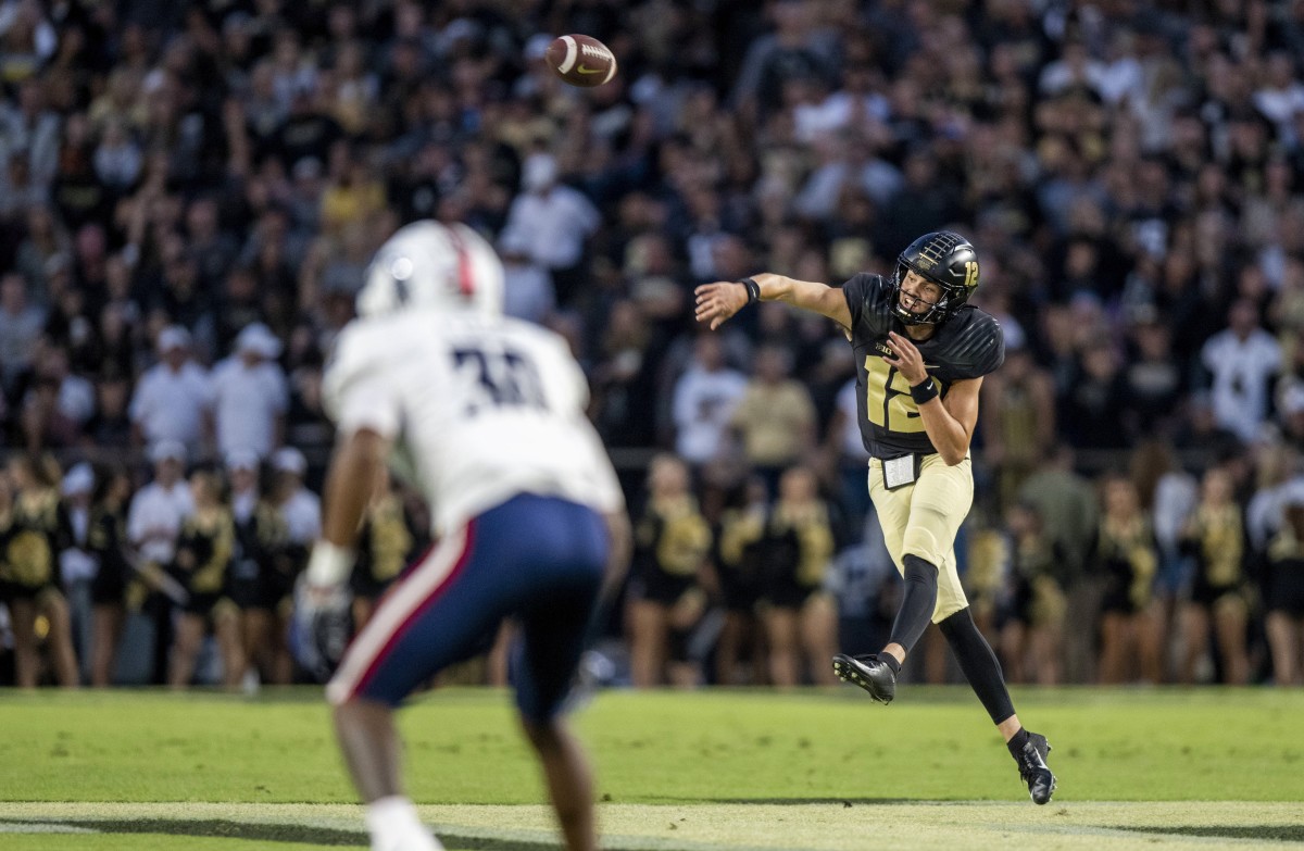Sep 24, 2022; West Lafayette, Indiana, USA; Purdue Boilermakers quarterback Austin Burton (12) throws a pass during the first quarter against the Florida Atlantic Owls at Ross-Ade Stadium.