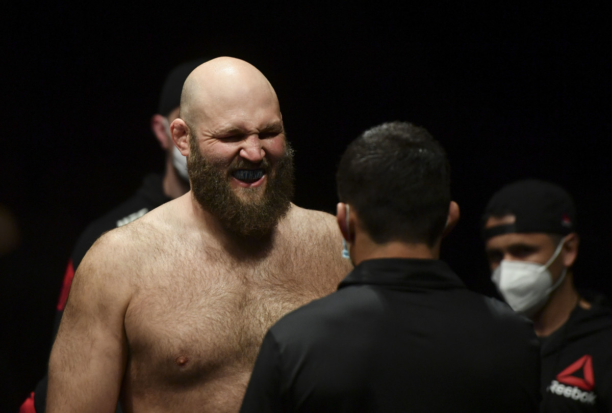 Ben Rothwell (red gloves) prepares to fight Ovince Saint Preux (blue gloves) during UFC Fight Night at VyStar Veterans Memorial Arena.