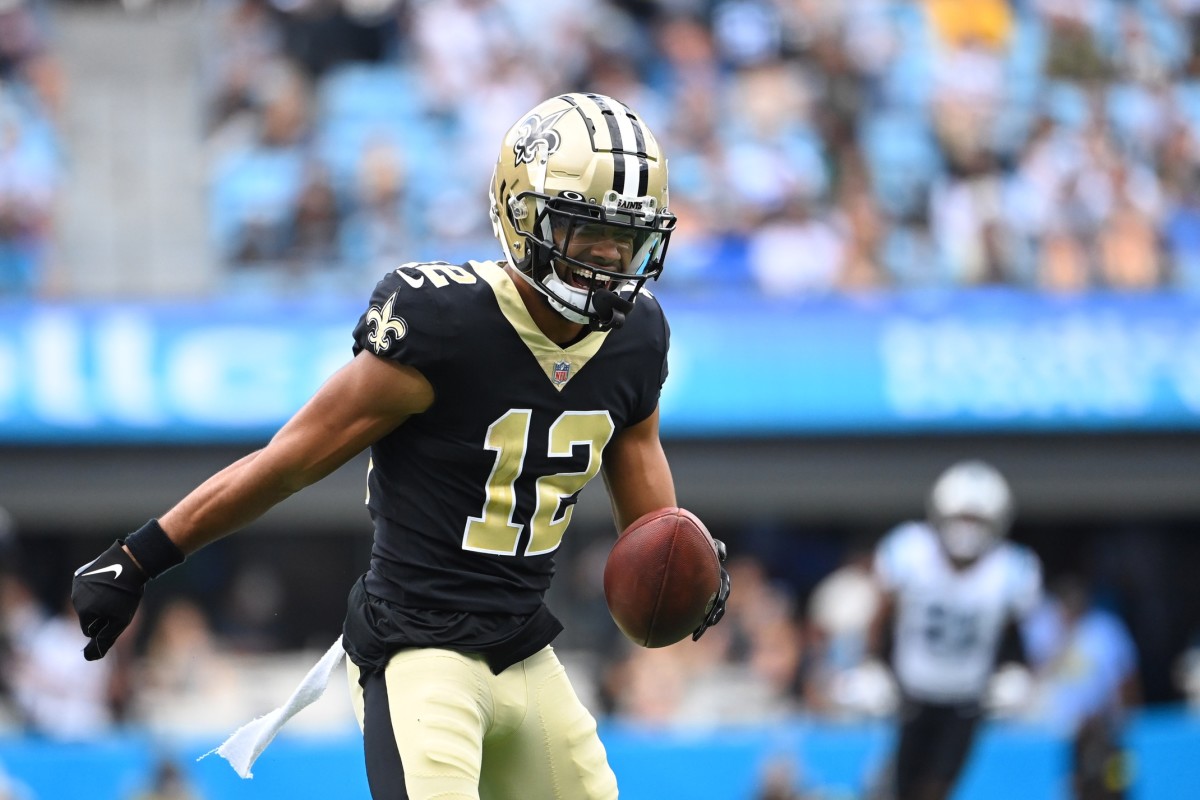 Chris Olave reacts after a big catch against the Carolina Panthers. 