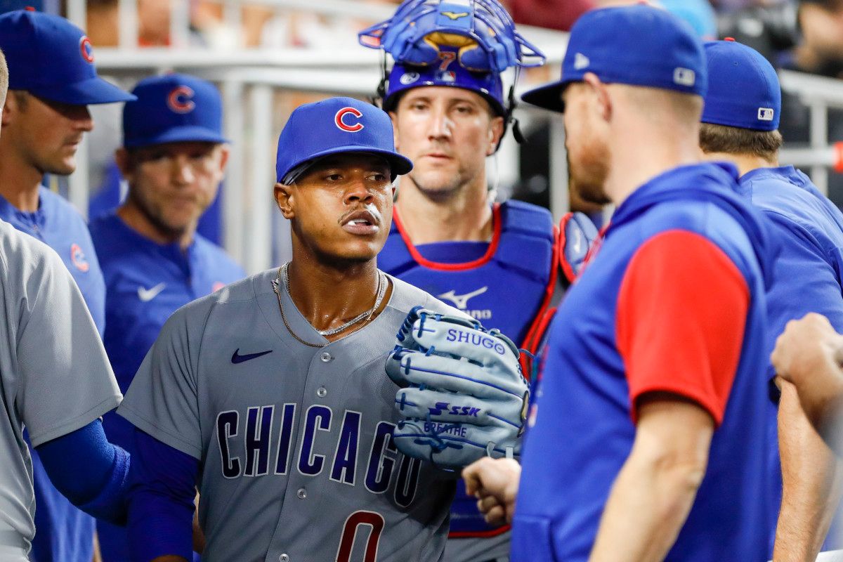 Marcus Stroman is congratulated by his teammates in the dugout after a strong start versus Miami.