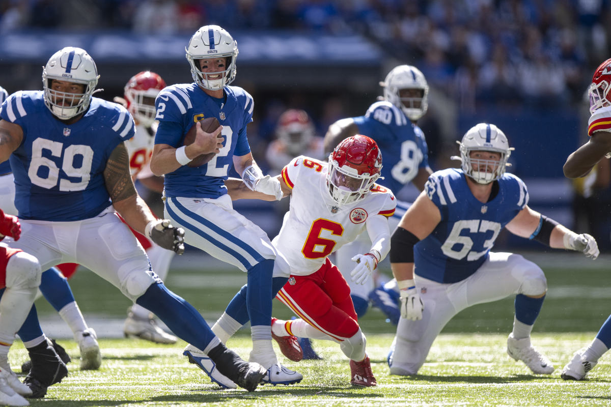 Sep 25, 2022; Indianapolis, Indiana, USA; Indianapolis Colts quarterback Matt Ryan (2) is sacked by Kansas City Chiefs safety Bryan Cook (6) during the second half at Lucas Oil Stadium.