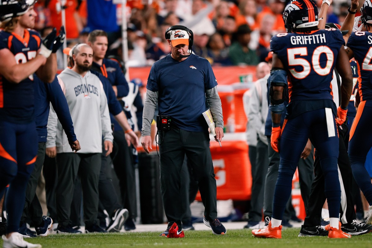 Denver Broncos head coach Nathaniel Hackett challenges a call in the fourth quarter against the San Francisco 49ers at Empower Field at Mile High.