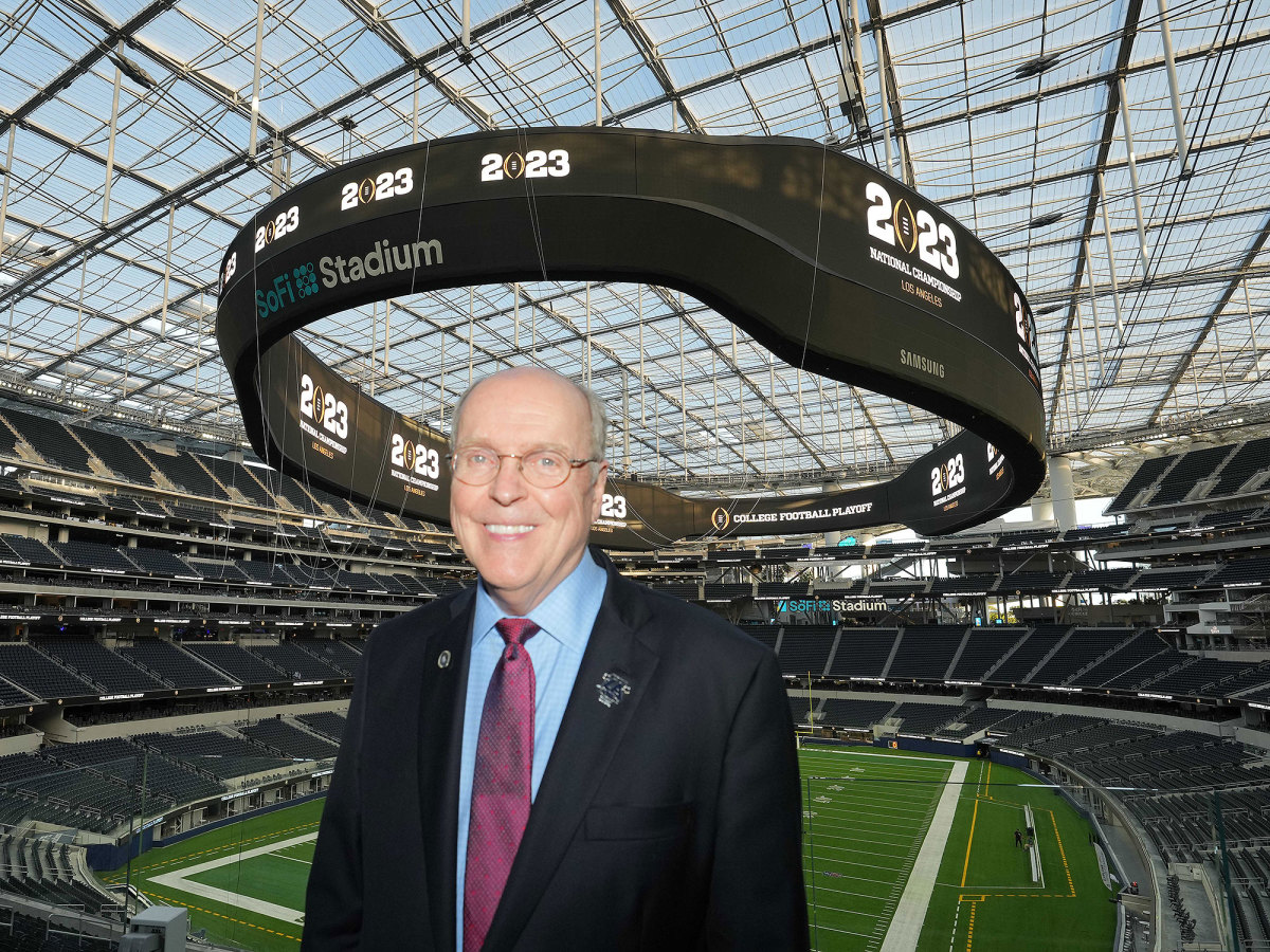 Bill Hancock poses in front of SoFi Stadium