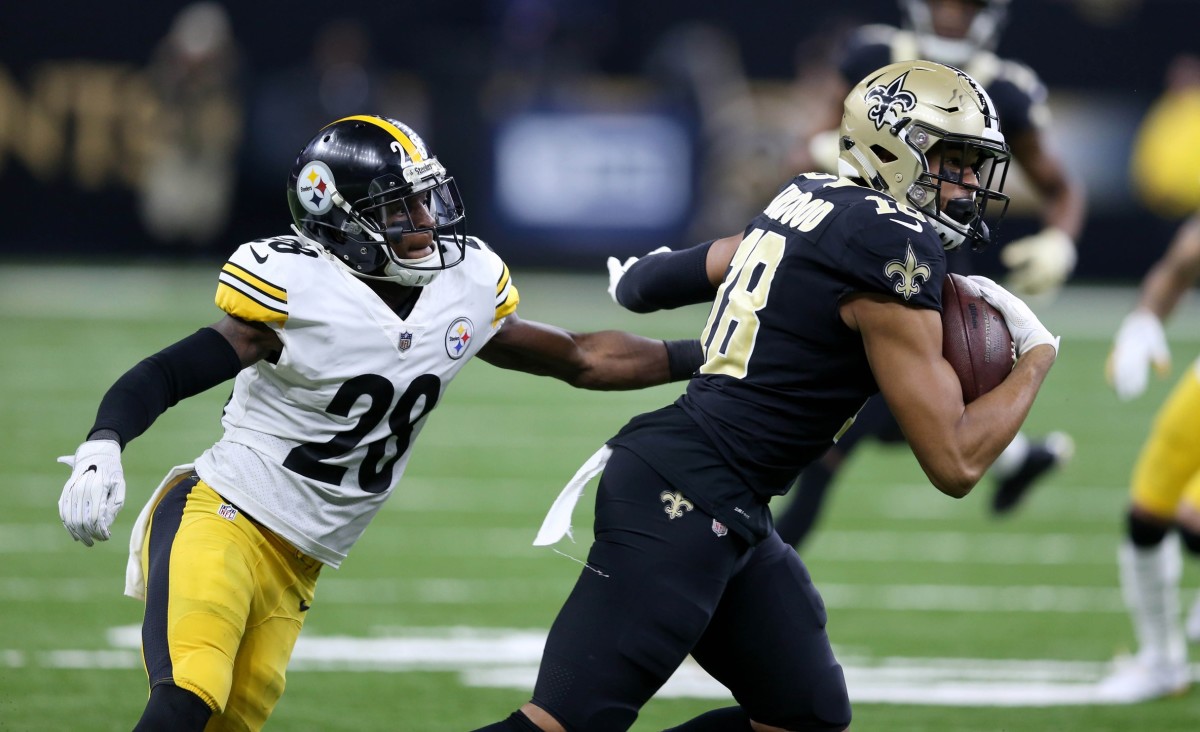 Dec 23, 2018; New Orleans Saints receiver Keith Kirkwood (18) runs from Pittsburgh Steelers cornerback Mike Hilton (28) after a catch. Mandatory Credit: Chuck Cook-USA TODAY Sports
