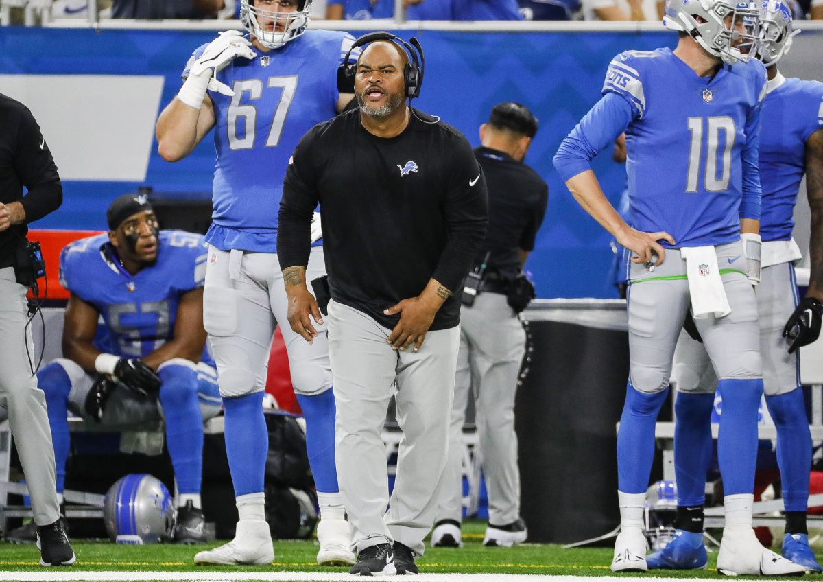 Duce Staley calls out from the sideline during a Lions game