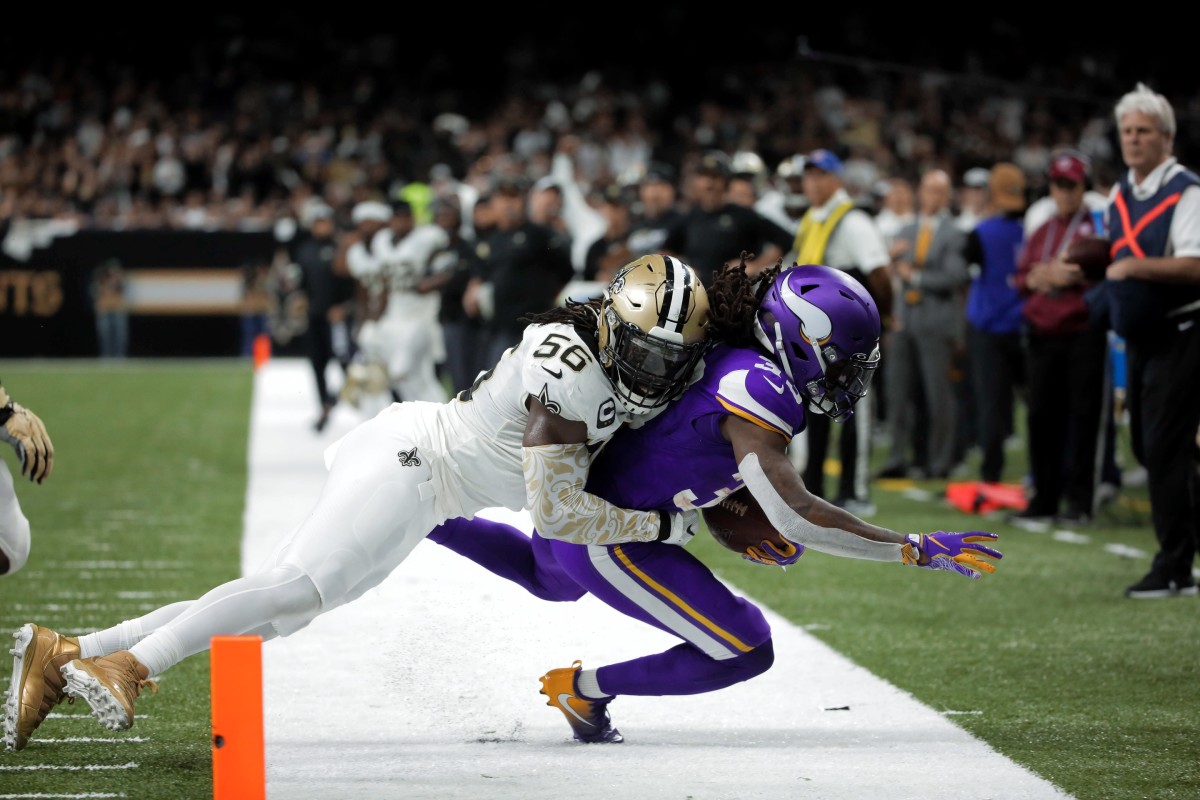 Jan 5, 2020; New Orleans Saints linebacker Demario Davis (56) tackles Minnesota Vikings running back Dalvin Cook (33) during a NFC Wild Card game. Mandatory Credit: Derick Hingle-USA TODAY 