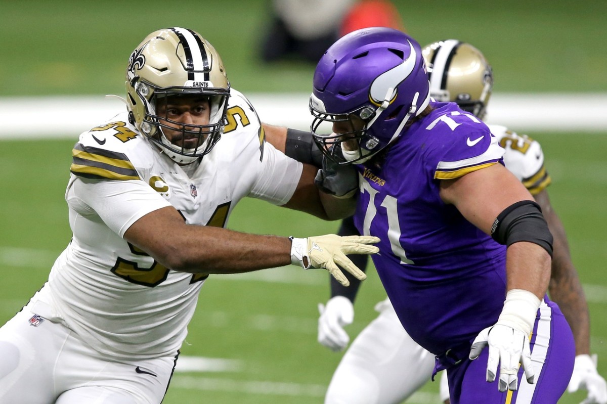 Dec 25, 2020; New Orleans Saints defensive end Cameron Jordan (94) engages Minnesota Vikings offensive tackle Riley Reiff (71). Mandatory Credit: Chuck Cook-USA TODAY