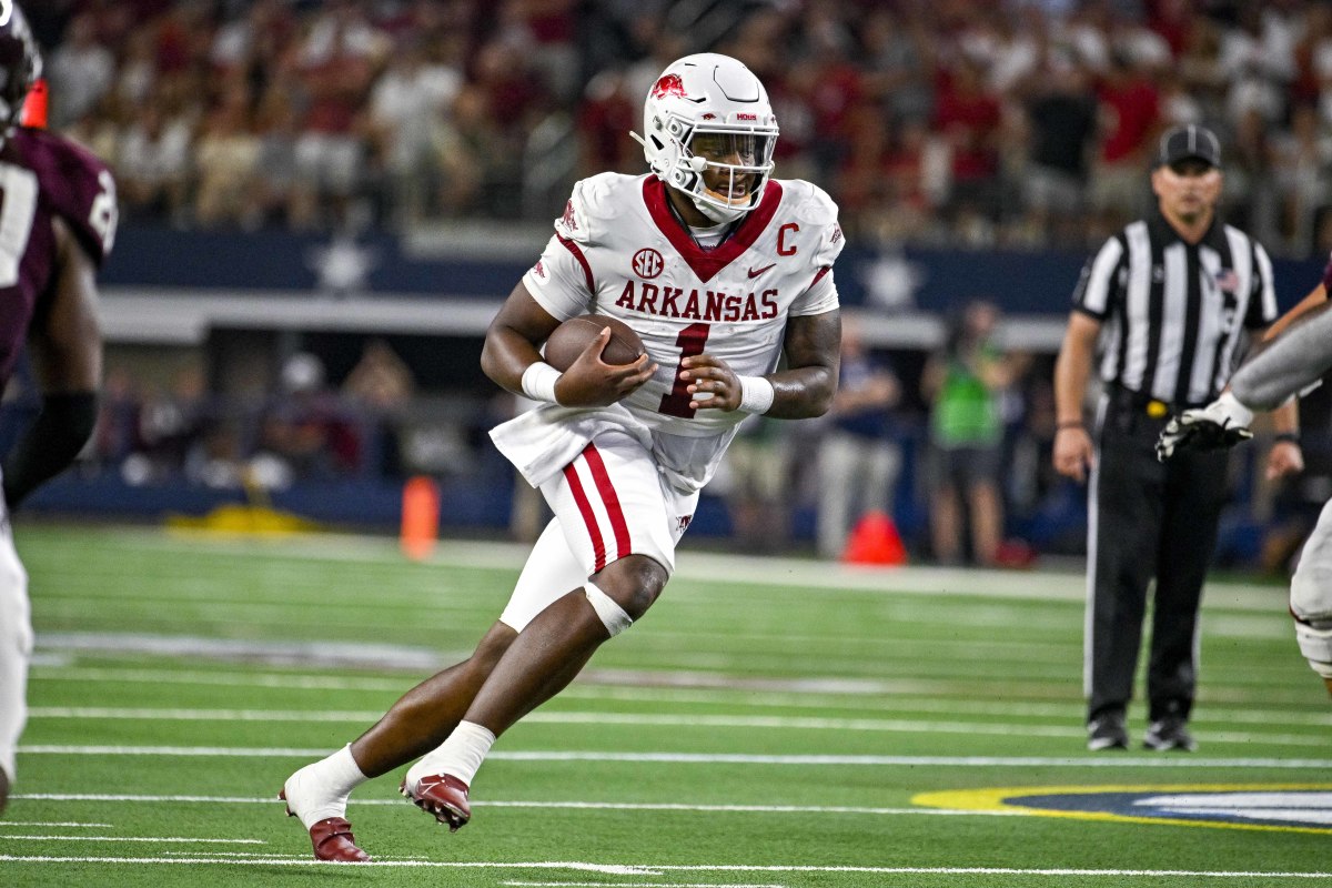 Sep 24, 2022; Arlington, Texas, USA; Arkansas Razorbacks quarterback KJ Jefferson (1) runs for a touchdown against the Texas A&M Aggies during the second half at AT&T Stadium. Mandatory Credit: Jerome Miron-USA TODAY Sports