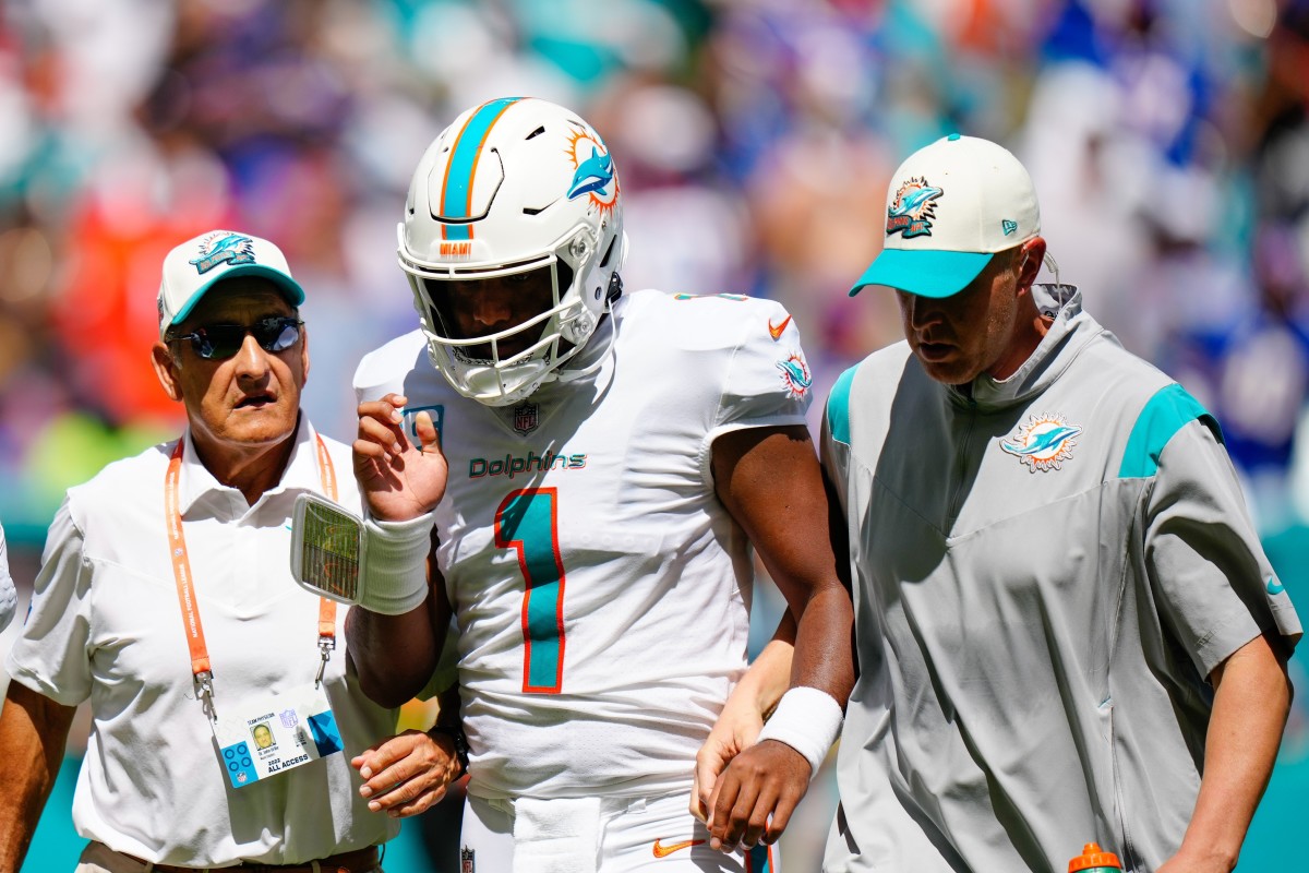 Dolphins quarterback Tua Tagovailoa is taken off the field after slamming his head on the field.