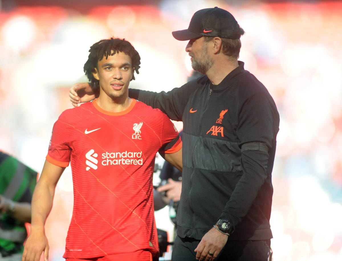 Jurgen Klopp pictured (right) with his arm around Trent Alexander-Arnold after Liverpool beat Manchester City in an FA Cup semi-final in April 2022
