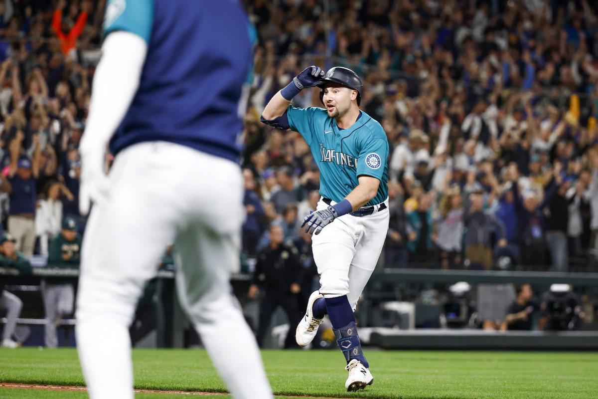 Sep 30, 2022; Seattle, Washington, USA; Seattle Mariners catcher Cal Raleigh (29) reacts after hitting a walk-off solo-home run against the Oakland Athletics during the ninth inning at T-Mobile Park. Seattle defeated Oakland 2-1, clinching a wild card and ending a 21-year playoff drought.
