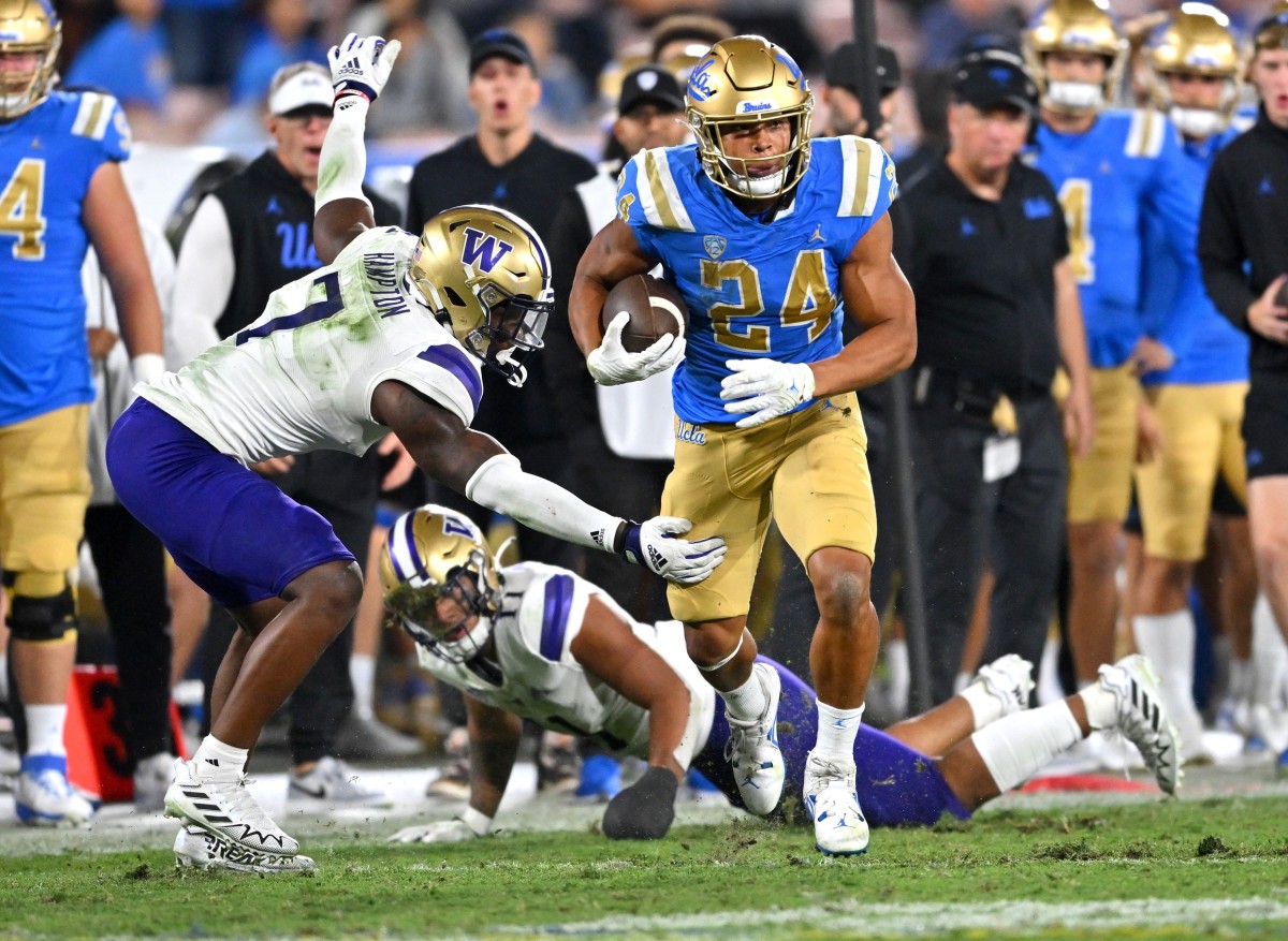 Dom Hampton misses a tackle on UCLA running back Zach Charbonnet.