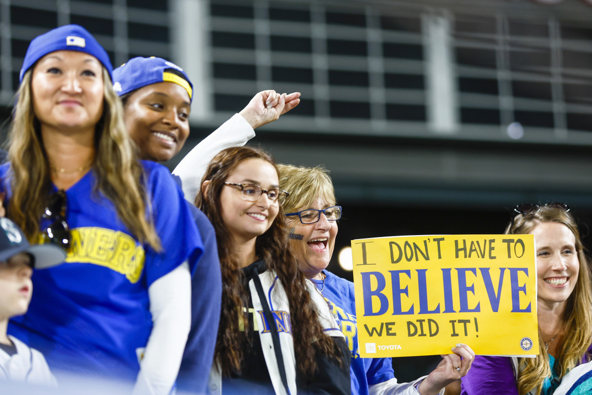 Sep 30, 2022; Seattle, Washington, USA; Seattle Mariners fans cheer following a 2-1 victory against the Oakland Athletics to clinch a wild card playoff berth at T-Mobile Park.