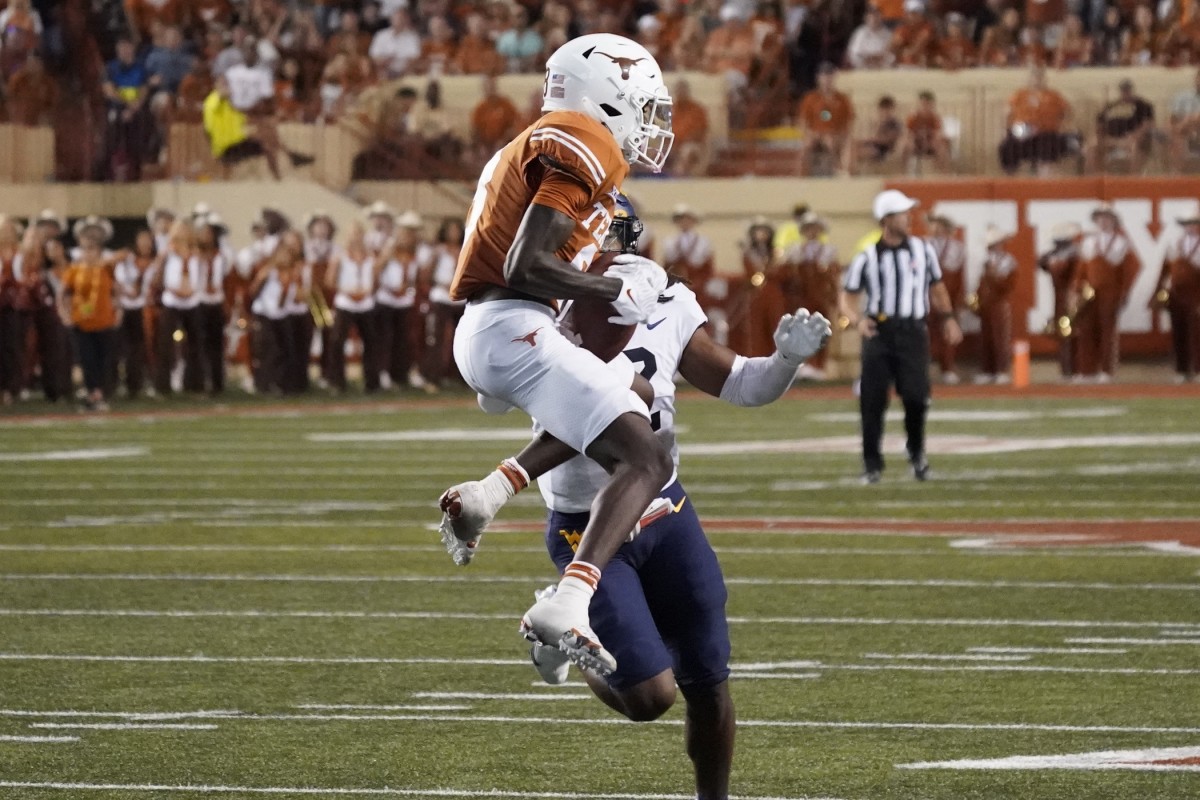 Oct 1, 2022; Austin, Texas, USA; Texas Longhorns wide receiver Xavier Worthy (8) reacts after catching a pass during the first half against the West Virginia Mountaineers at Darrell K Royal-Texas Memorial Stadium.