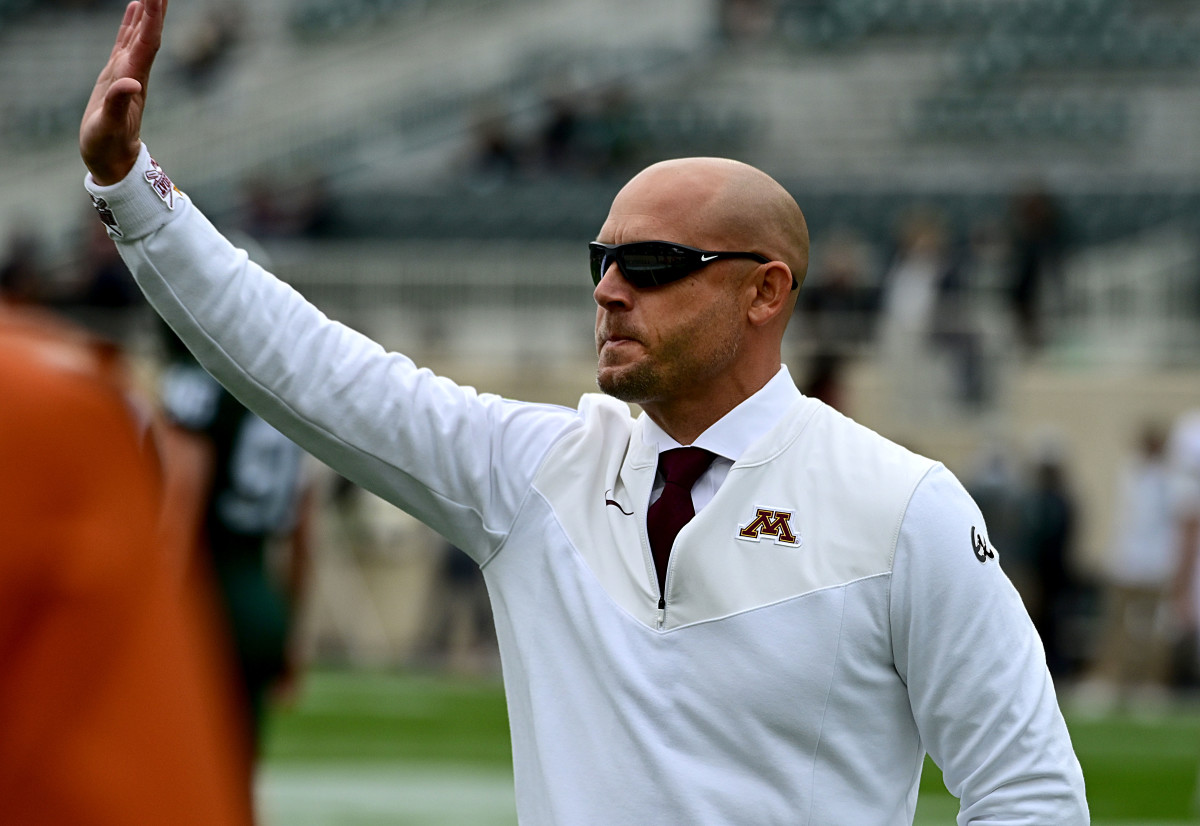 Sep 24, 2022; East Lansing, Michigan, USA; Minnesota Golden Gophers head coach PJ Fleck waves to fans at Spartan Stadium before playing MSU. Mandatory Credit: Dale Young-USA TODAY Sports