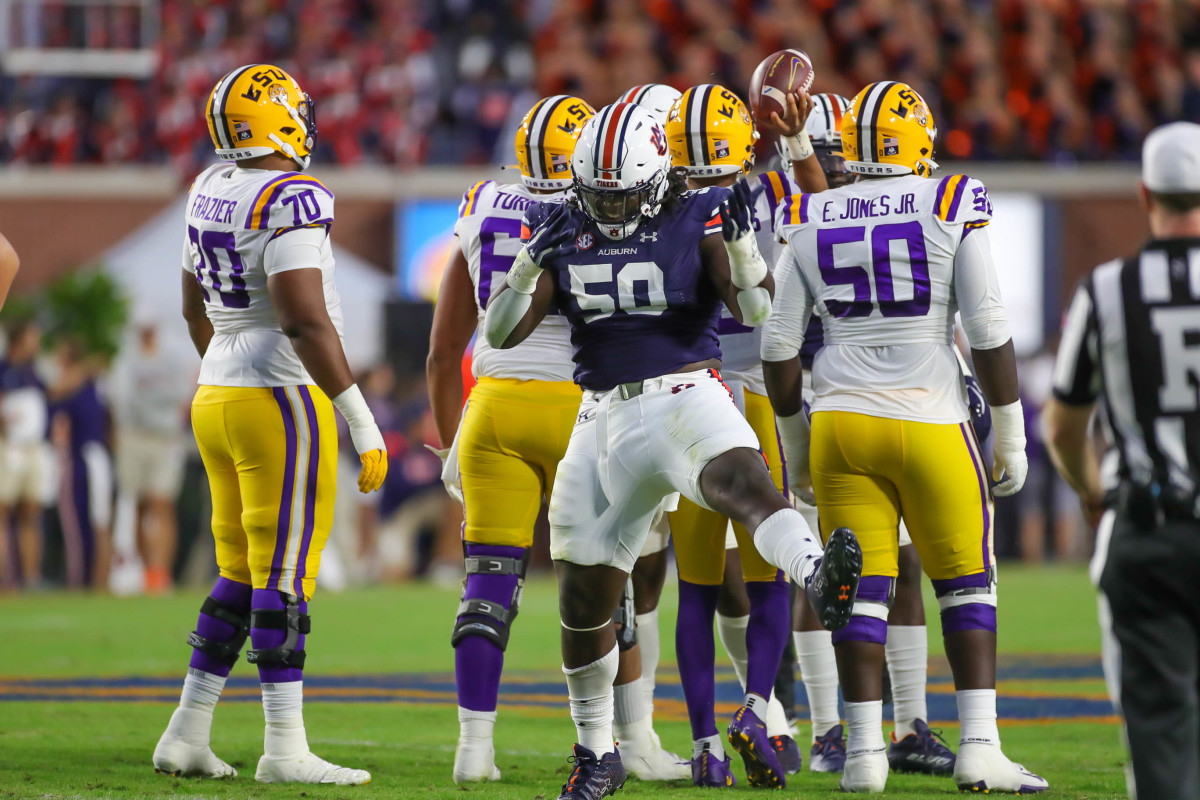 Auburn Tigers defensive lineman Marcus Harris (50) celebrates his tackle for loss during the game between the LSU Tigers and the Auburn Tigers at Jordan-Hare Stadium on Oct. 1, 2022.