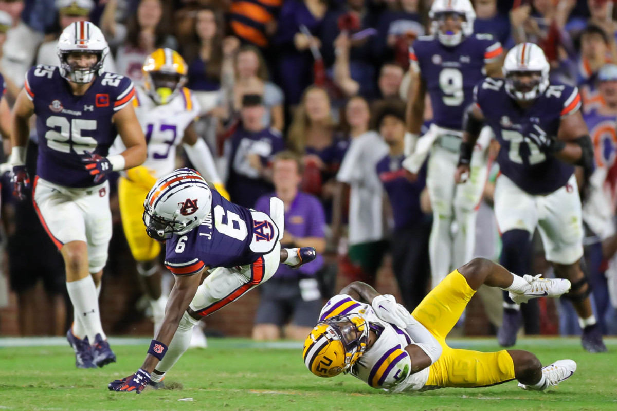 Auburn Tigers wide receiver Ja'Varrius Johnson (6) works to keep his footing for positive yards after the catch during the game between the LSU Tigers and the Auburn Tigers at Jordan-Hare Stadium on Oct. 1, 2022.