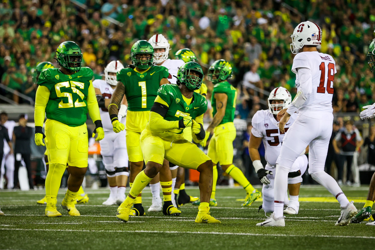 Oregon Ducks defensive lineman Brandon Dorlus (3) reacts after a big play against the Stanford Cardinal.