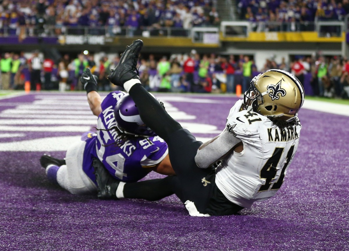 Jan 14, 2018; New Orleans Saints running back Alvin Kamara (41) catches a touchdown pass over Minnesota Vikings linebacker Eric Kendricks (54) in the fourth quarter of the NFC Divisional Playoff game. Mandatory Credit: Mark J. Rebilas-USA TODAY Sports