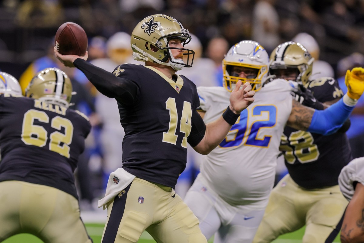 Aug 26, 2022; New Orleans Saints quarterback Andy Dalton (14) passes against the Los Angeles Chargers. Mandatory Credit: Stephen Lew-USA TODAY Sports