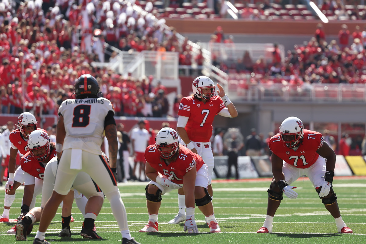 Utah Utes quarterback Cameron Rising (7) changes a play at the line scrimmage in the first quarter against the Oregon State Beavers at Rice-Eccles Stadium.