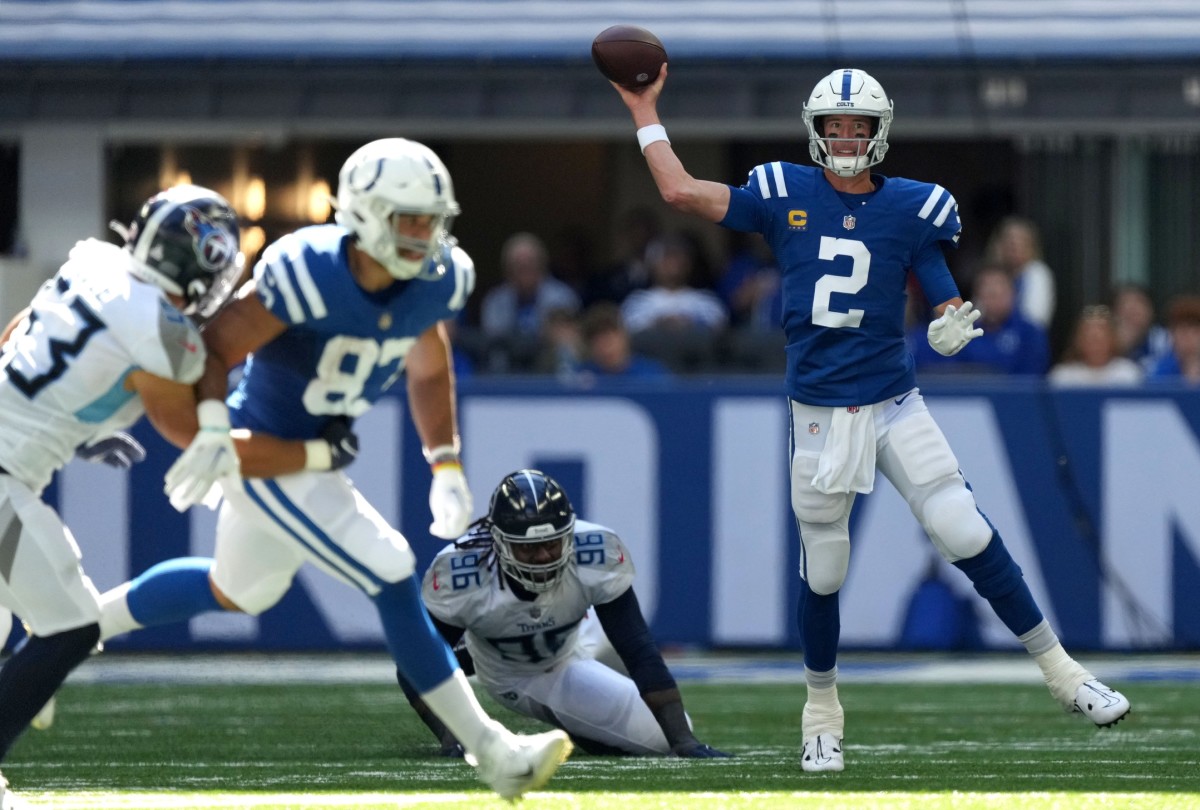 Oct 2, 2022; Indianapolis, Indiana, USA; Indianapolis Colts quarterback Matt Ryan (2) passes the ball against the Tennessee Titans during the first half at Lucas Oil Stadium. Mandatory Credit: Jenna Watson/IndyStar-USA TODAY NETWORK