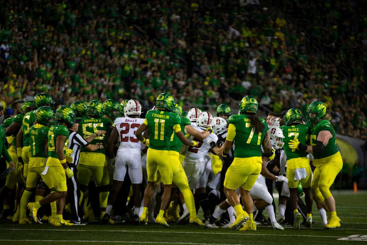 Oregon and Stanford players fight as the No. 13 Oregon Ducks take on the Stanford Cardinal Saturday, Oct. 1, 2022, at Autzen Stadium in Eugene, Ore. Ncaa Football Oregon Stanford Football Stanford At Oregon