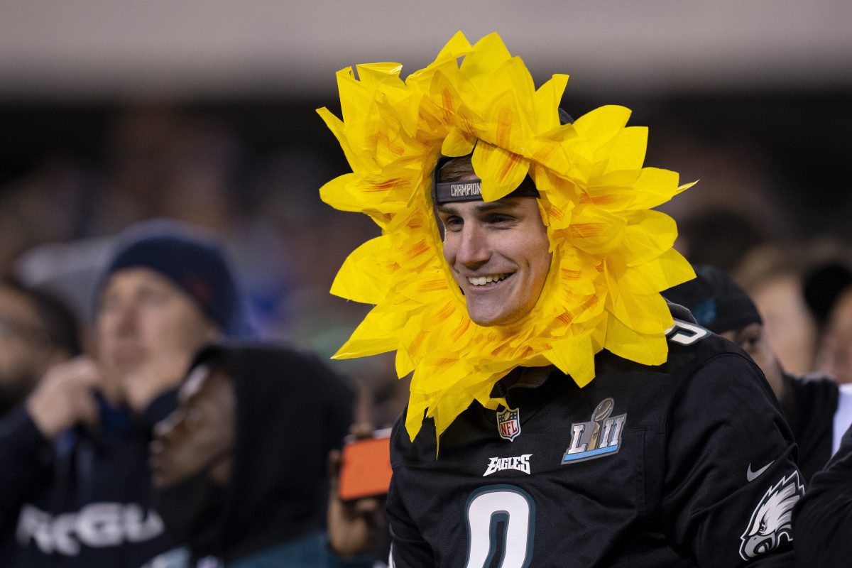 An Eagles fan dresses up as a flower for a game in November 2021