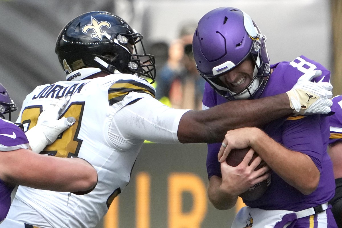Minnesota Vikings quarterback Kirk Cousins (8) is pressured by New Orleans Saints defensive end Cameron Jordan (94). Mandatory Credit: Kirby Lee-USA TODAY Sports