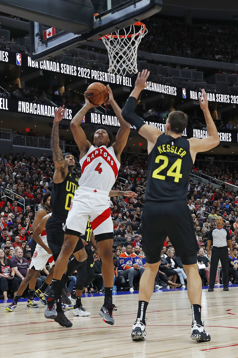 Oct 2, 2022; Edmonton, Alberta, CAN; Toronto Raptors forward Scottie Barnes (4) shoots over Utah Jazz center Walker Kessler (24) during the first quarter at Rogers Place. Mandatory Credit: Perry Nelson-USA TODAY Sports