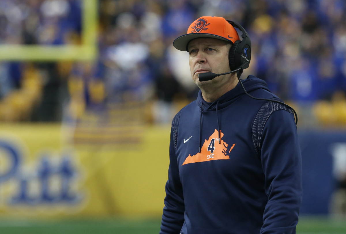 , Pennsylvania, USA; Virginia Cavaliers head coach Bronco Mendenhall looks on from the sidelines against the Pittsburgh Panthers during the second quarter at Heinz Field.