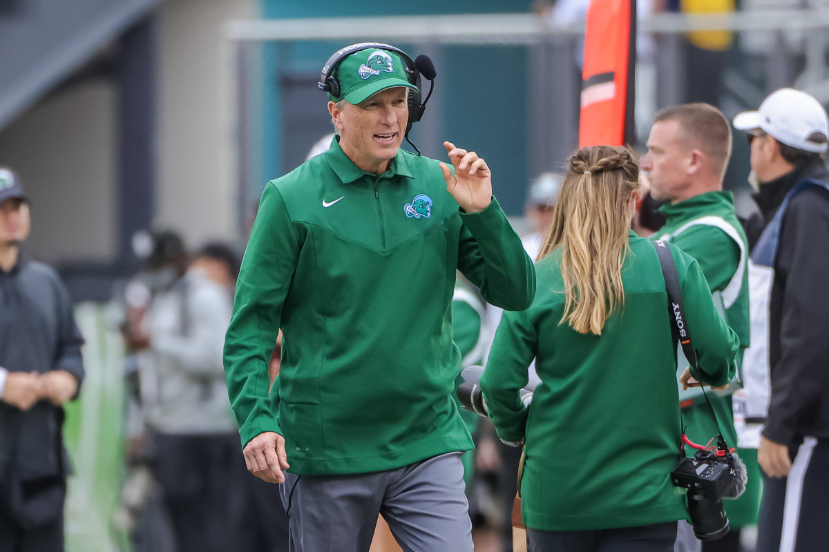 Tulane Green Wave head coach Willie Fritz walks the sideline during the second quarter against the UCF Knights at Bounce House